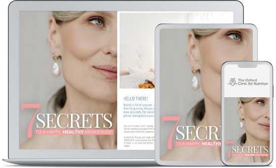 Website mockup on laptop, tablet, and phone featuring a woman and the title “SECRETS” in pink.