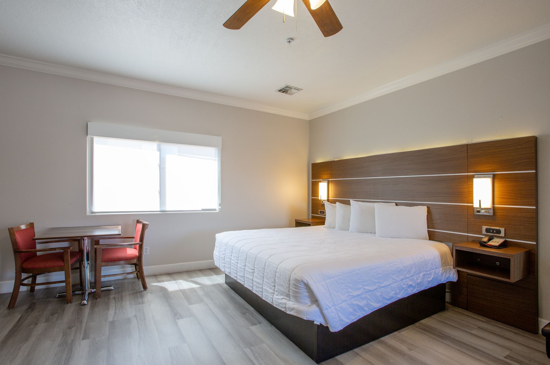 Second-floor Cozy Kitchenette King Suite with comfy king bed and scenic viewing deck access