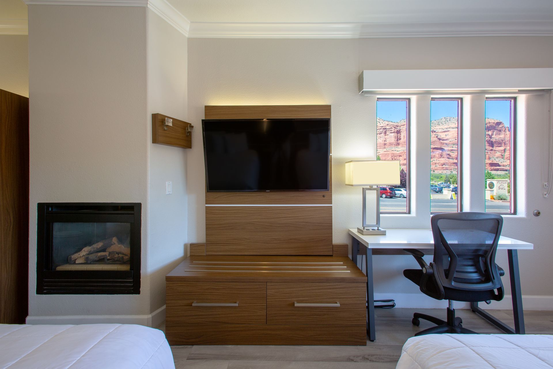 Cozy Two Queens Fireplace Getaway at Wildflower Inn with double queen beds and gas fireplace