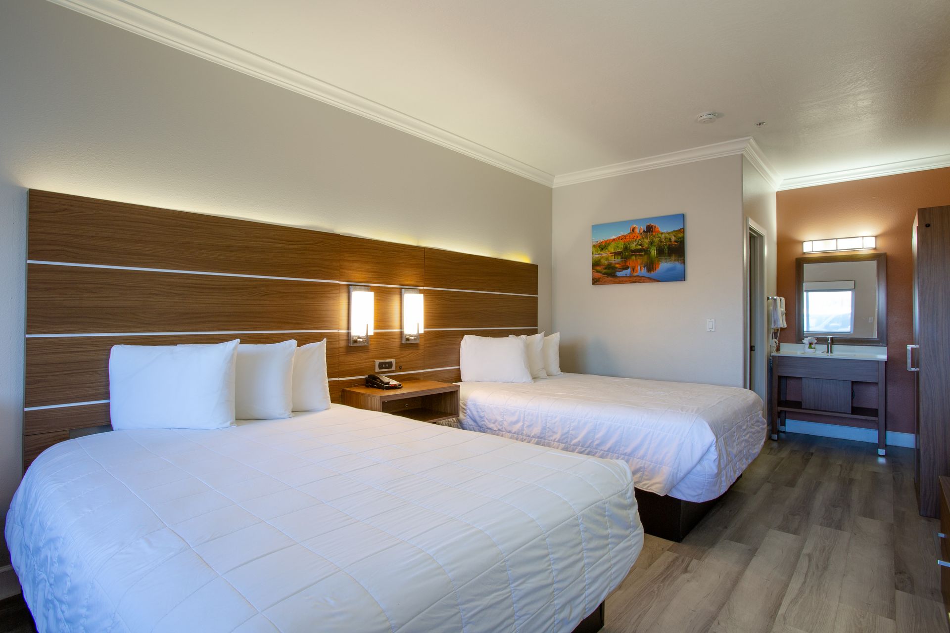 Ground Level Queen Retreat room with two queen Beautyrest beds and cozy seating area