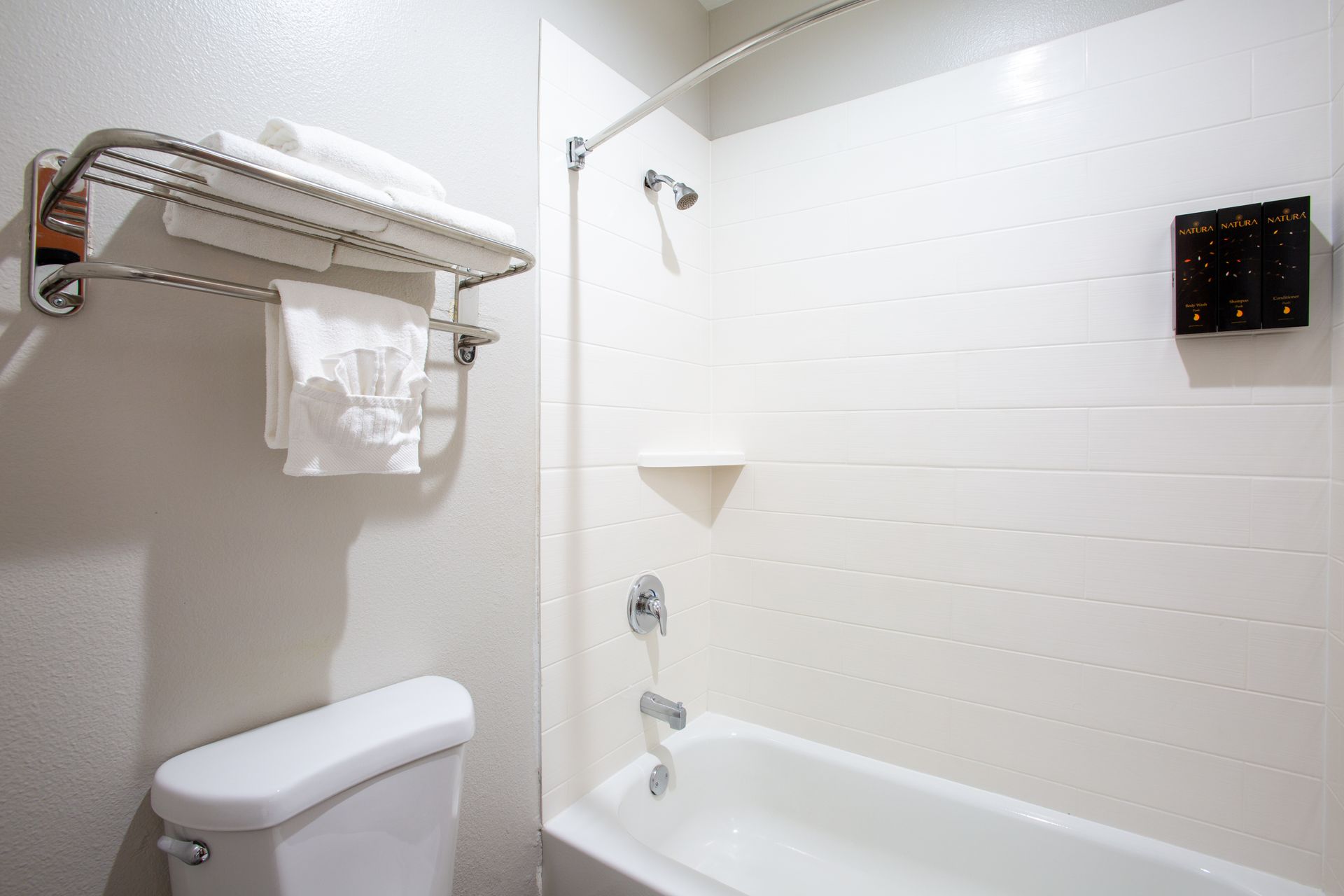 Clean and stylish toilet area inside the Ground Level Queen Retreat bathroom at Wildflower Inn Sedona