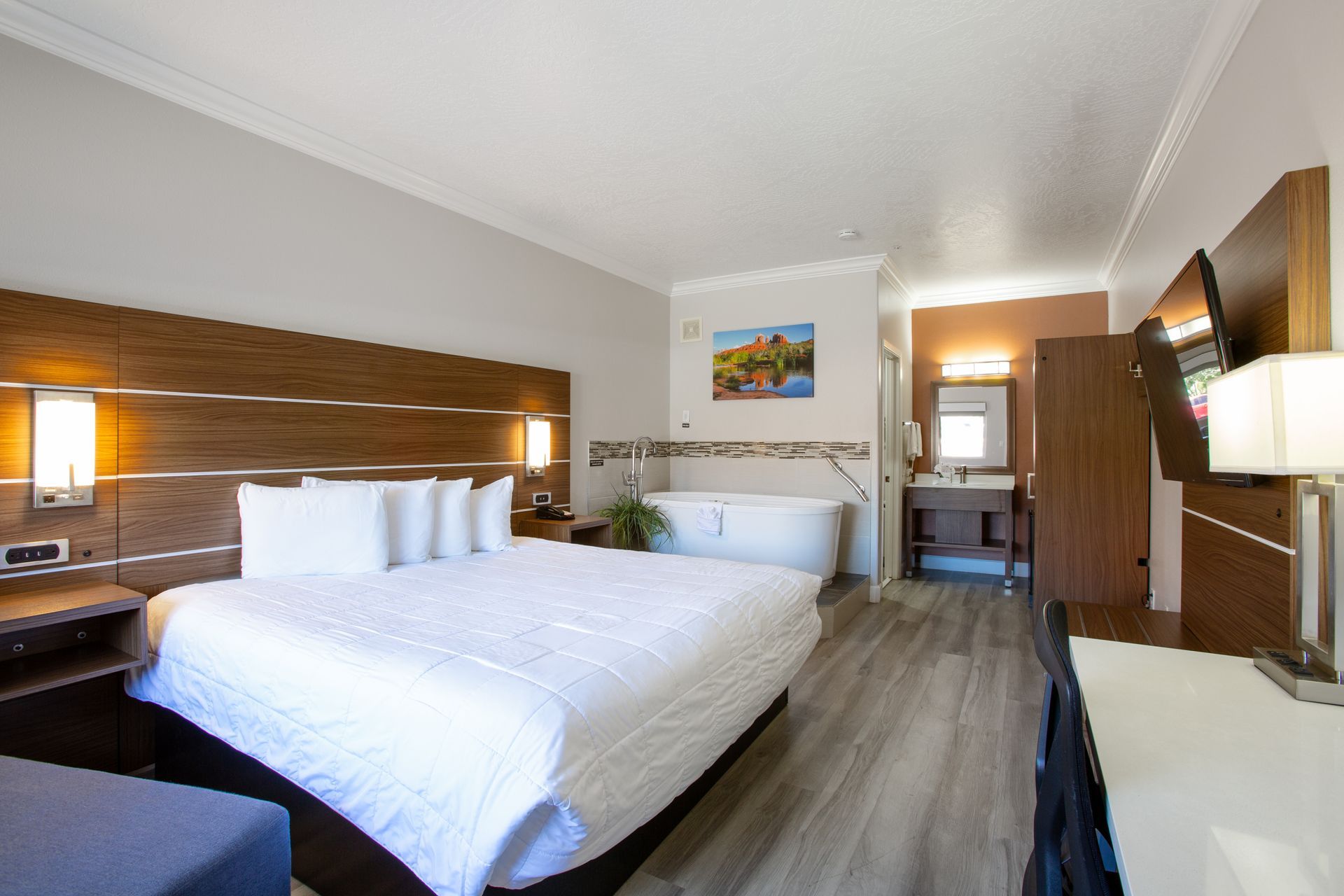 Inviting Wildflower Inn Sedona room with plush king bed and in-room spa tub for relaxation