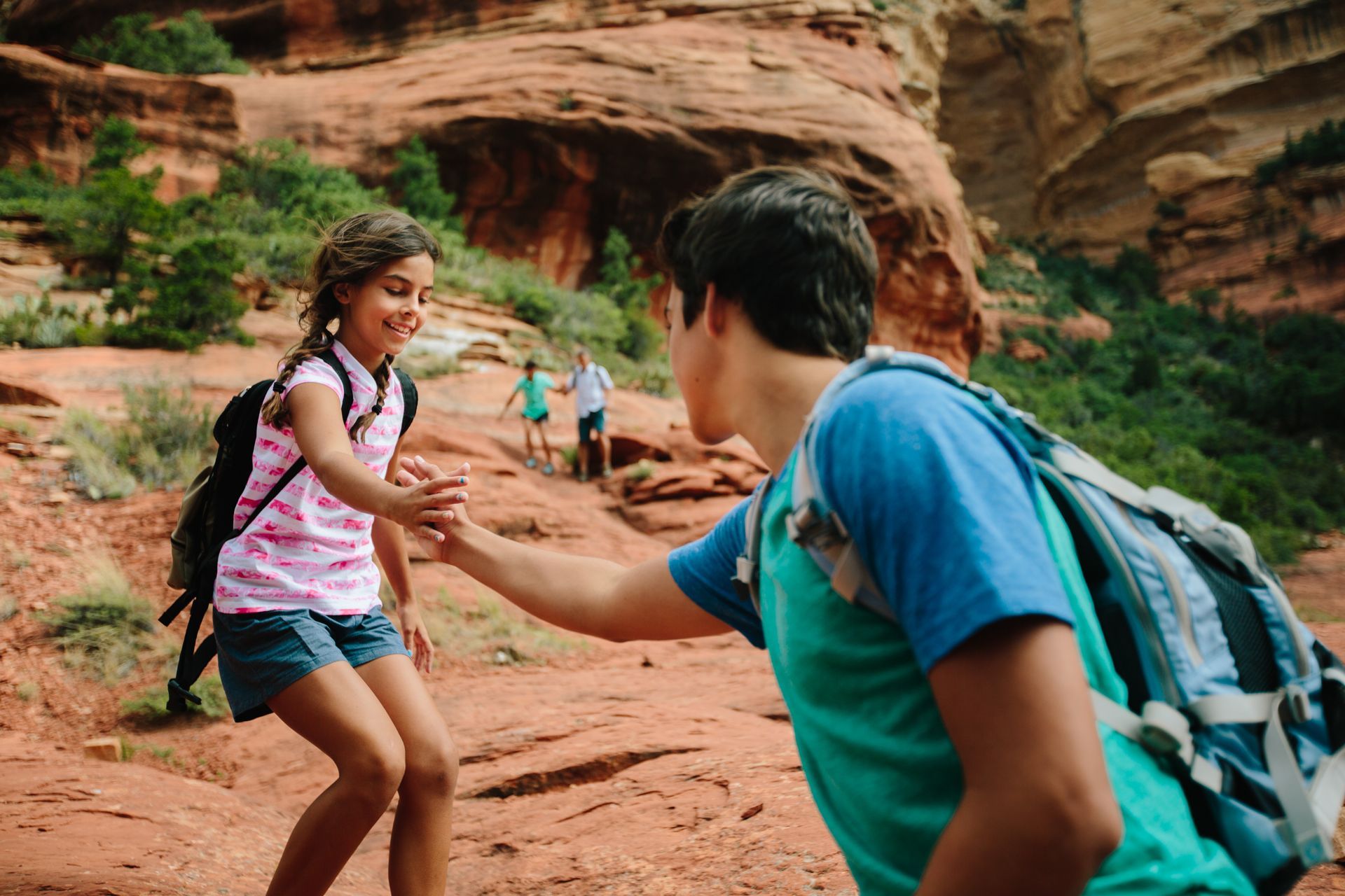 Hiking Sedona’s majestic red rock formations at sunrise near Wildflower Inn