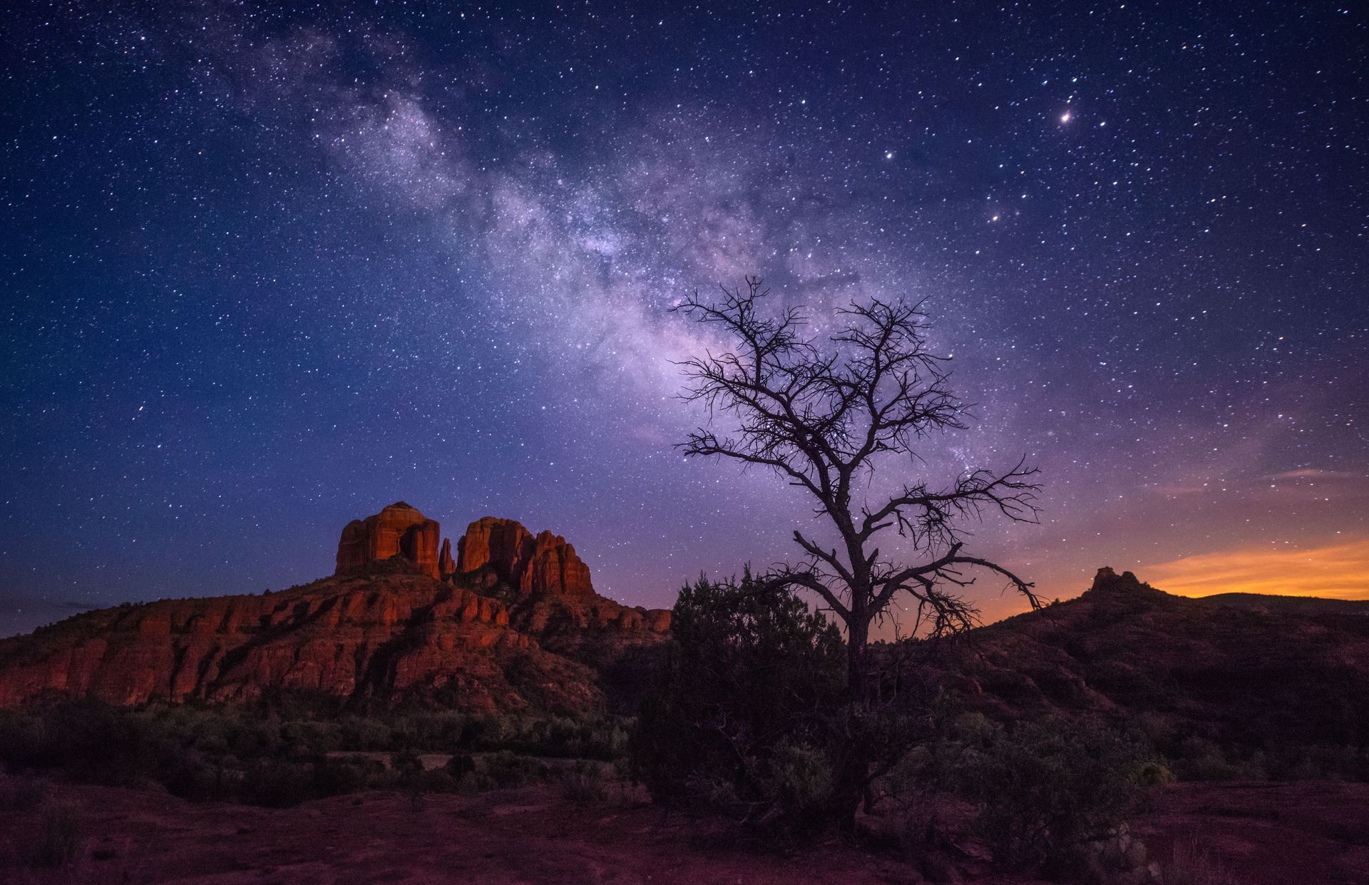 Cathedral Rock under a starry night sky in Sedona’s Dark Sky Community
