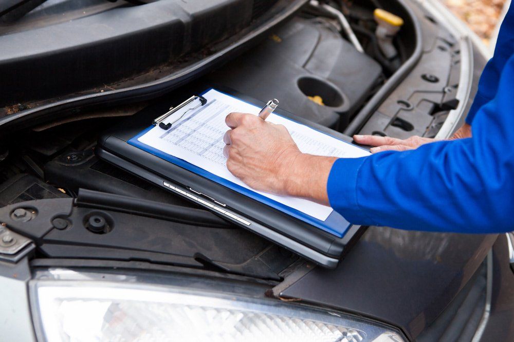 Mechanic Maintaining Car Records — Logbook Service in West Gosford NSW