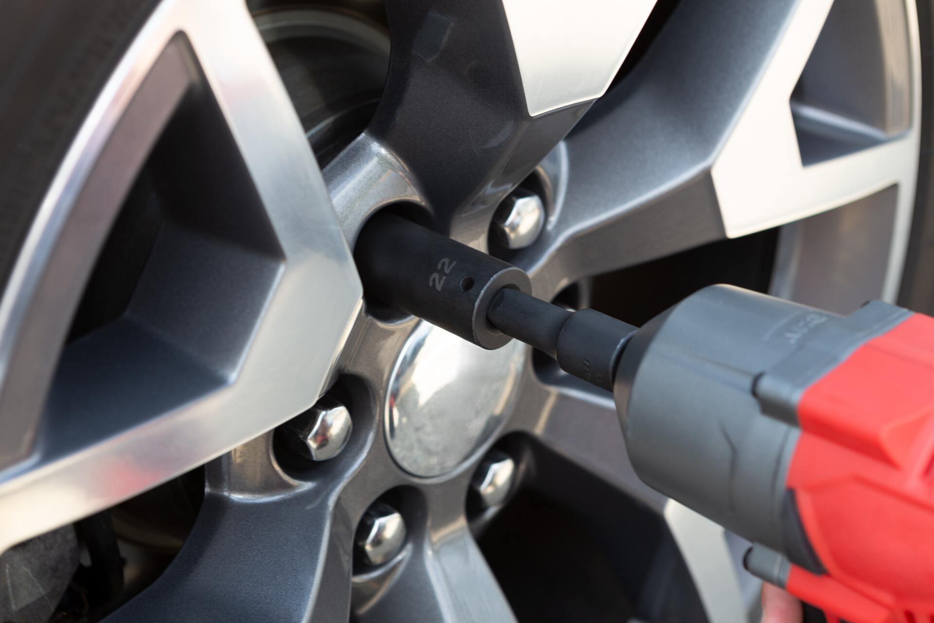 Car Wheel Being Serviced — Logbook Service in West Gosford NSW