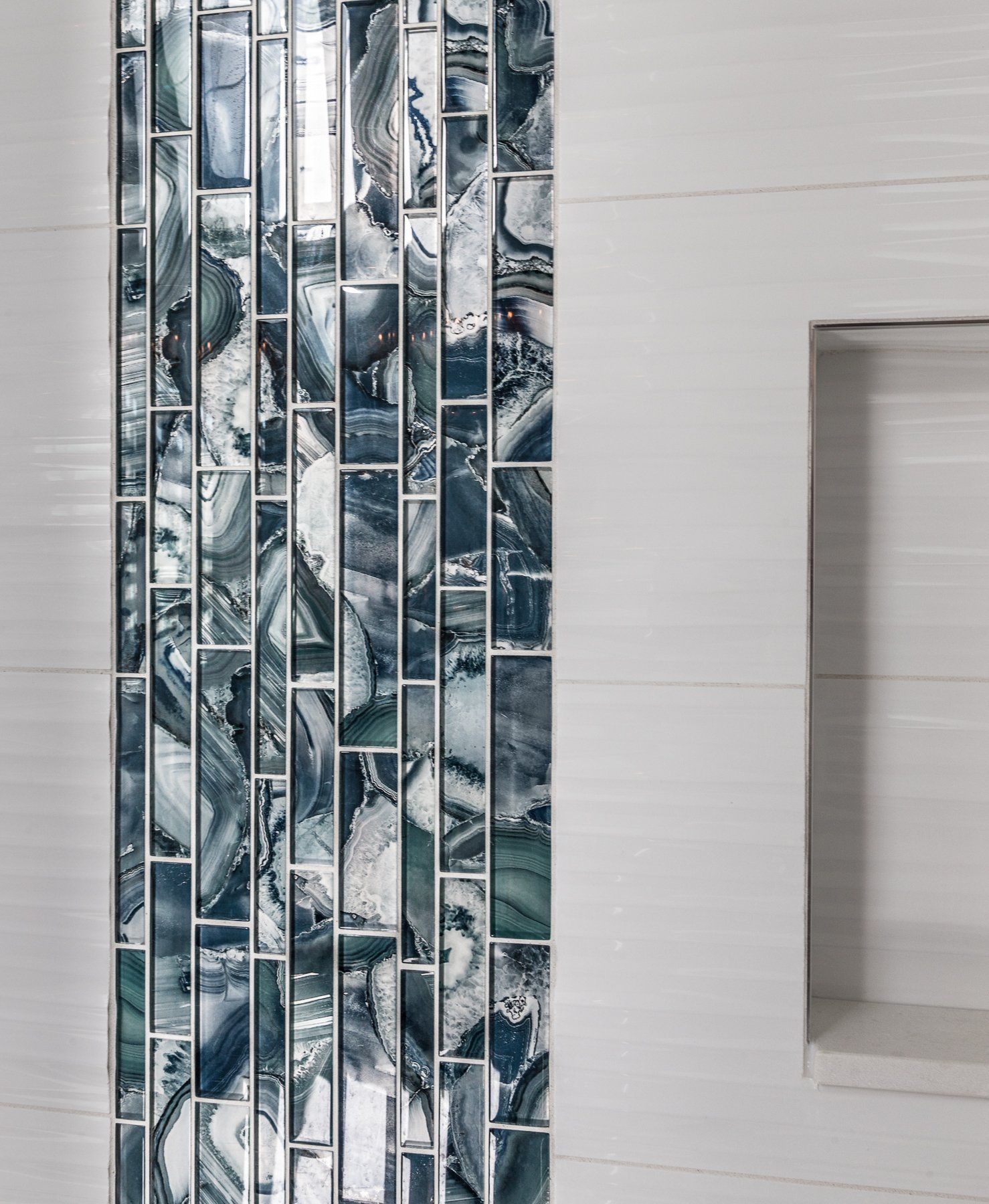 A wall with a row of tiles on it