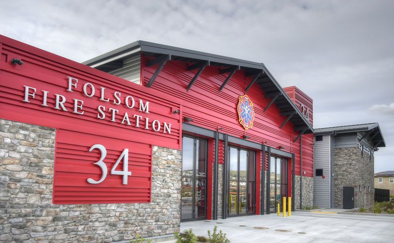 Folsom Fire Station 34 with red and stone exterior and large garage doors