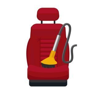 Red car seat with a vacuum cleaner attached, shown on a white background