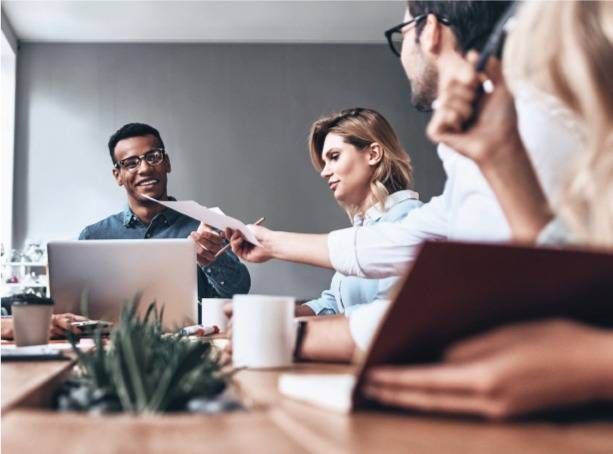 Business group discussing Business group discussing