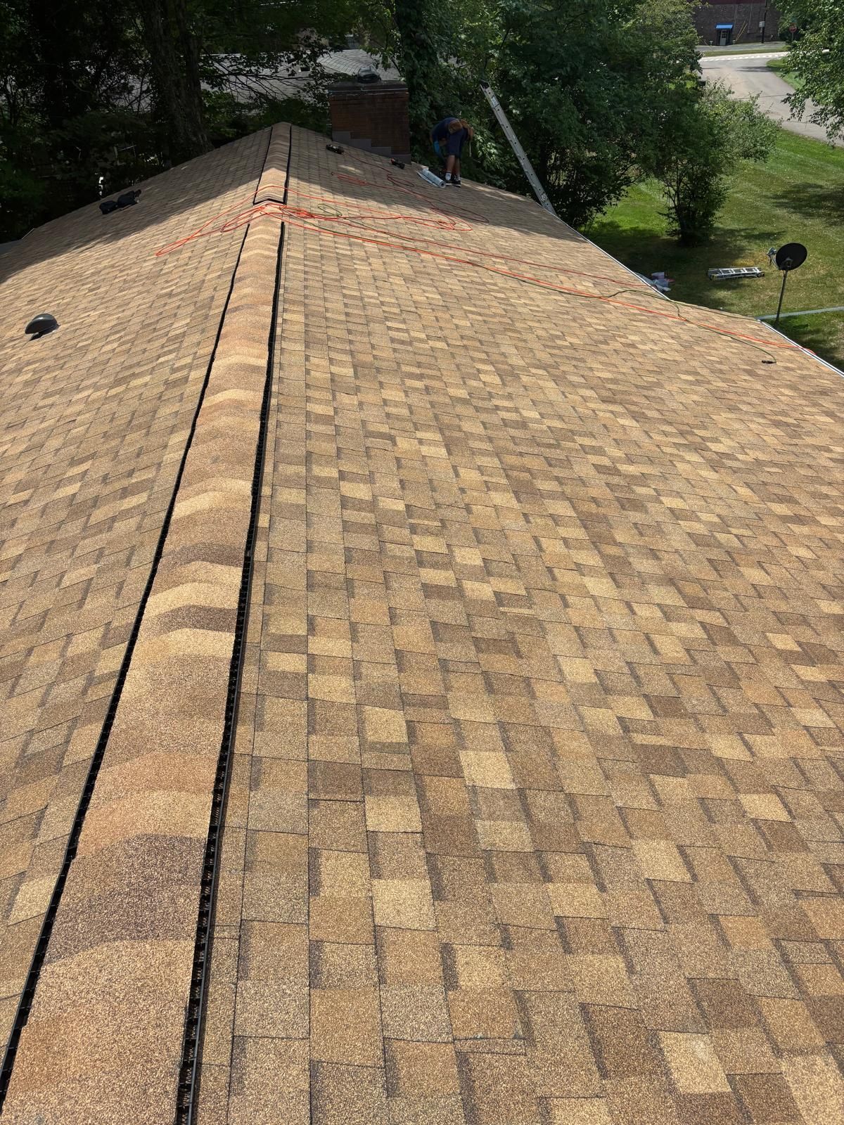 A close up of a roof with shingles on it.