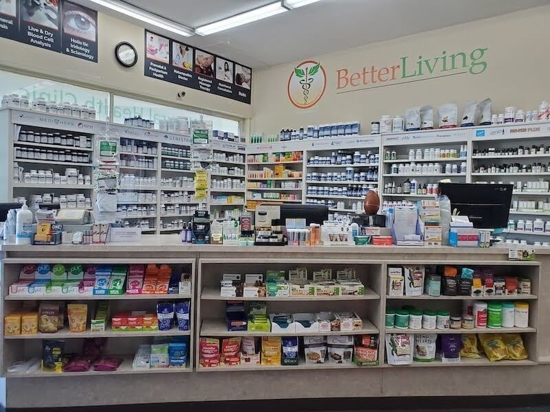 Interior of the Better Living store, showing shelves of supplements and natural health products