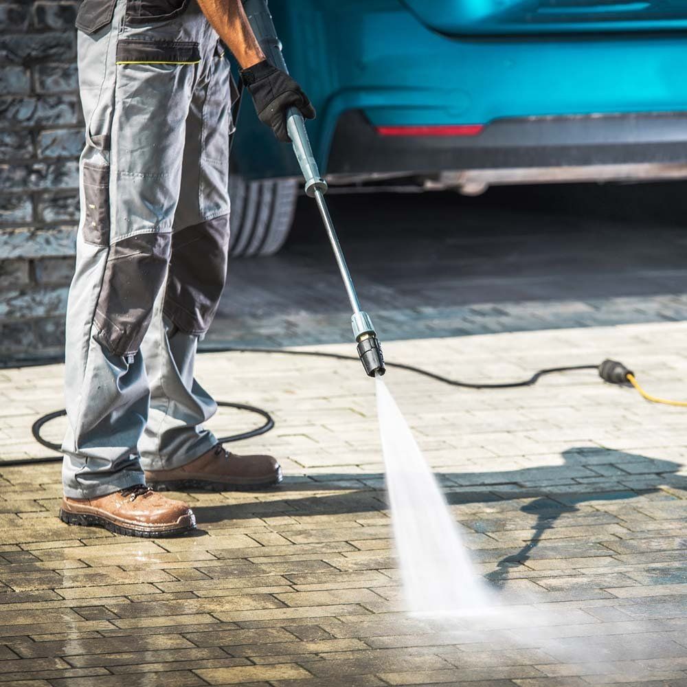 Pressure Washing On The Driveway — Springfield, IL — Midwest Power/Soft Washing Pressure Washing On The Driveway — Springfield, IL — Midwest Power/Soft Washing