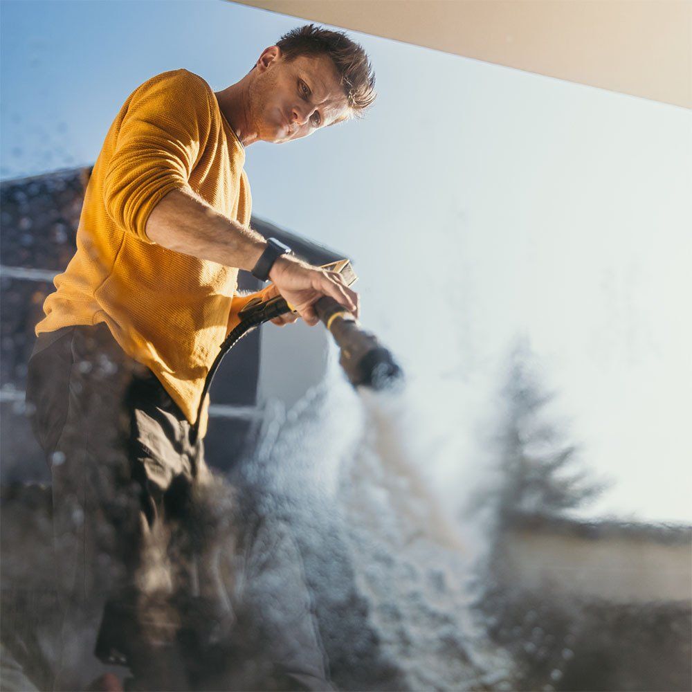 Cleaning The Window — Springfield, IL — Midwest Power/Soft Washing Cleaning The Window — Springfield, IL — Midwest Power/Soft Washing