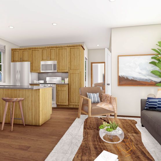 Kitchen and living room with wood cabinets, island, and furniture.