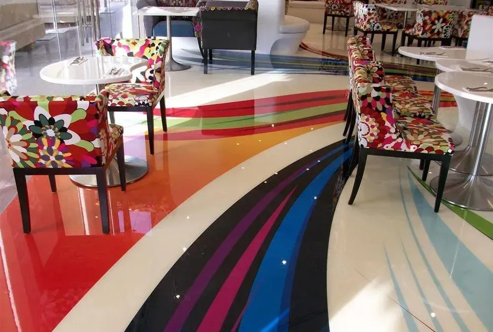 Colorful Café Seating With Floral Chairs and a Glossy Floor — Concrete Colour Solutions in Scone, NSW