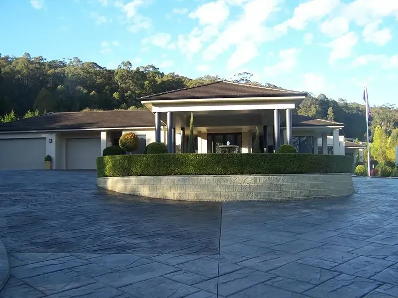 Modern Single-story House With a Stone Driveway, Covered Porch — Concrete Colour Solutions in Scone, NSW
