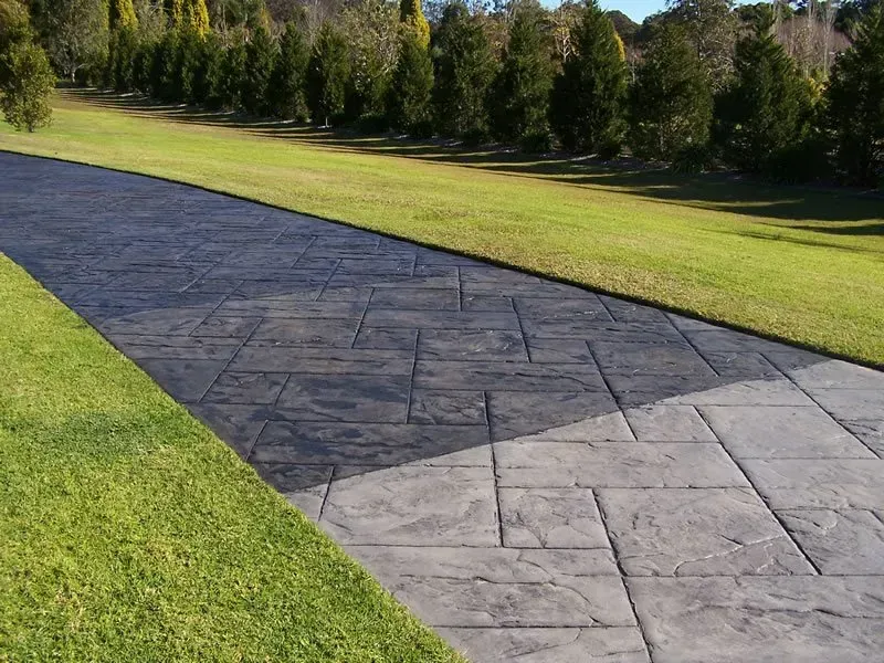 Stone Walkway Through a Green Park, Bordered by Grass and Trees — Concrete Colour Solutions in Muswellbrook, NSW
