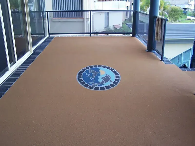 A balcony with a globe on the floor — Concrete Colour Solutions in Morisset, NSW
