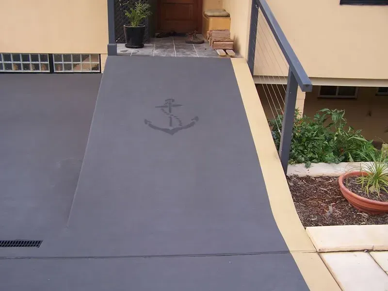 A ramp with an anchor painted on it — Concrete Colour Solutions in Morisset, NSW