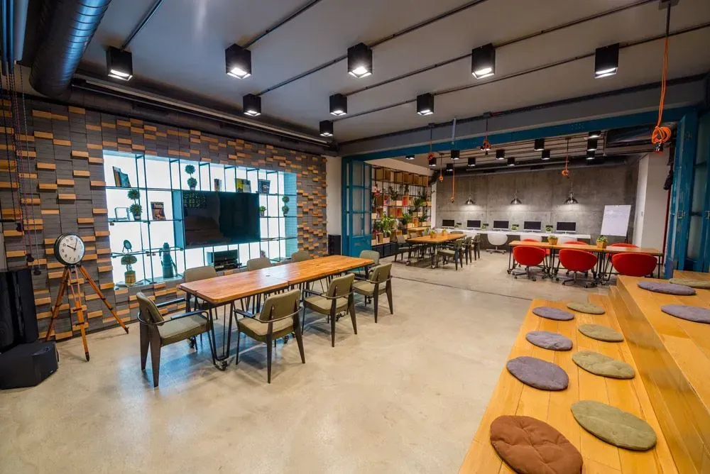 A Large Room with Tables and Chairs in It — Concrete Colour Solutions in Central Coast, NSW