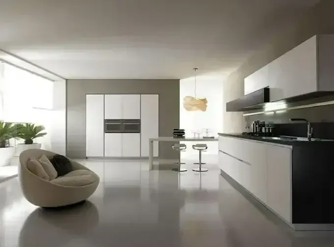 Modern Minimalist Kitchen and Living Space With White Cabinets — Concrete Colour Solutions in Singleton, NSW