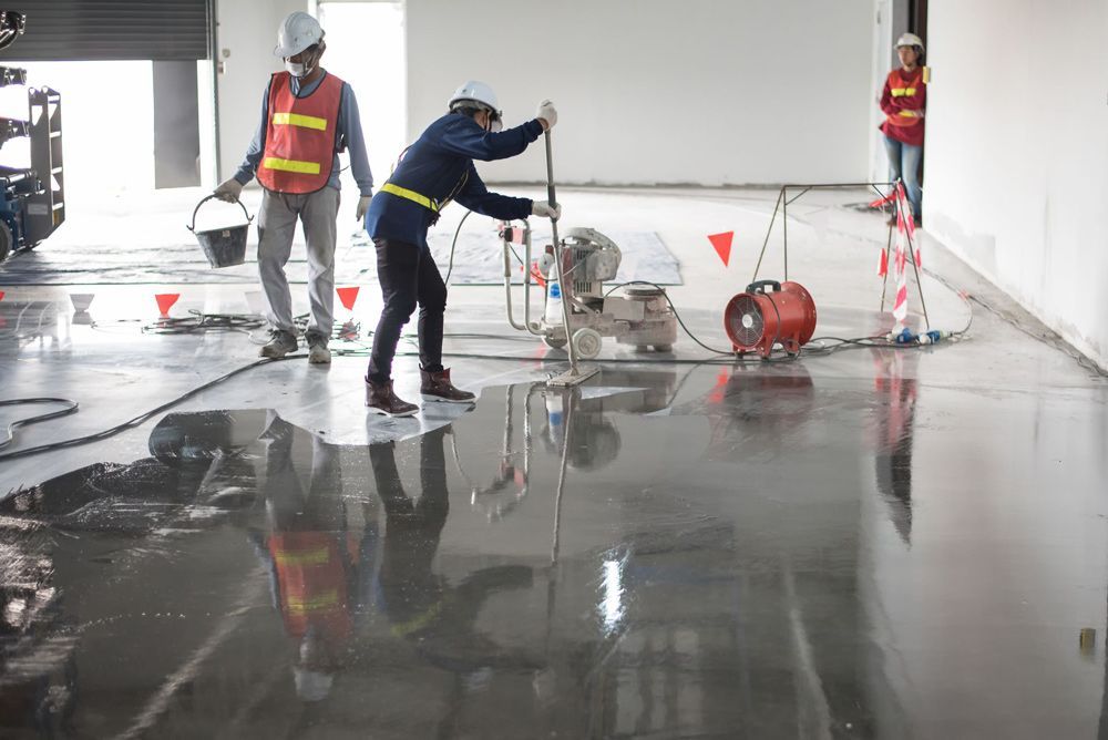 Workers Applying Concrete Coating In Newcastle