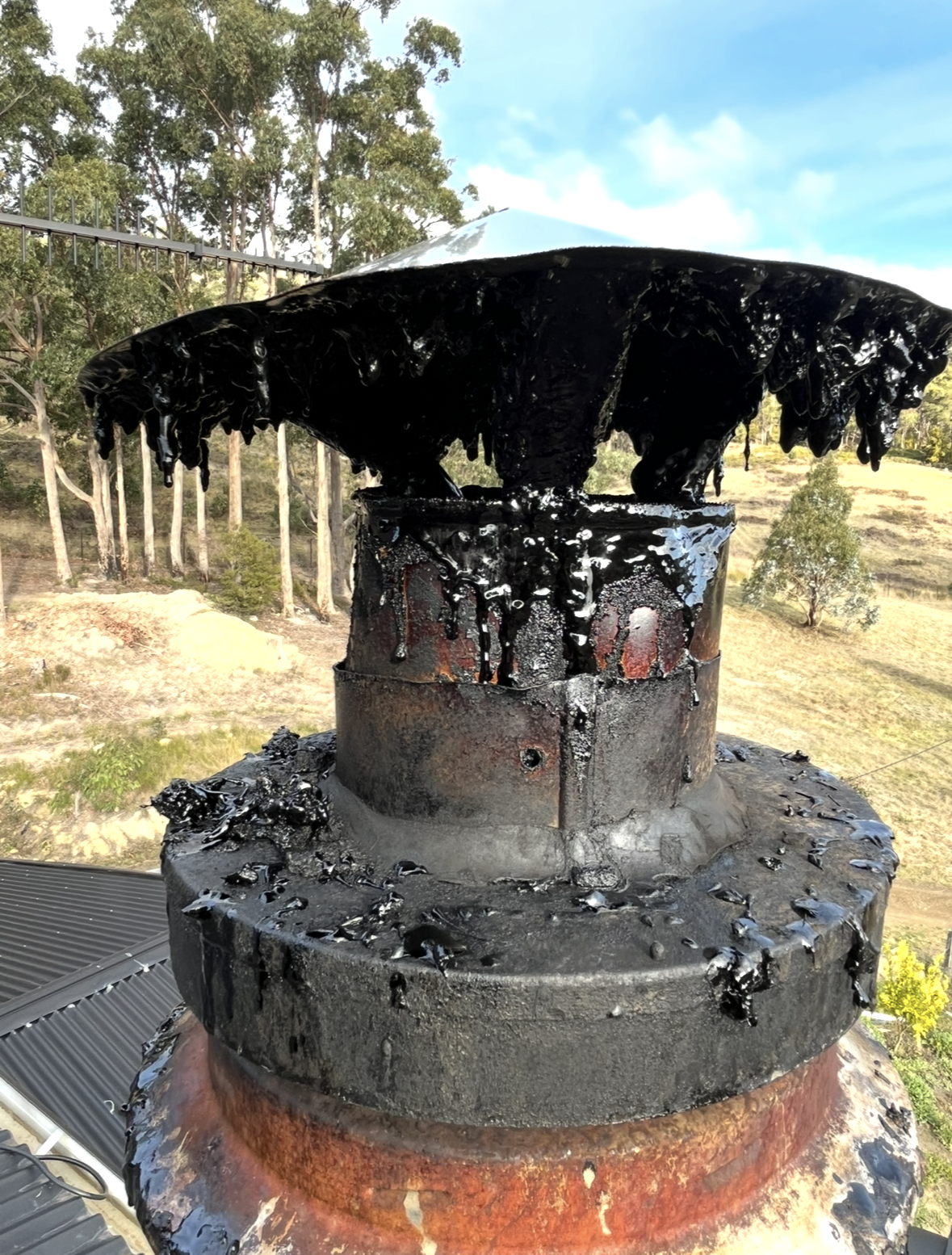 Blackened Outdoor Metal Chimney With Heavy Soot — The Flue Pro In Devonport, TAS