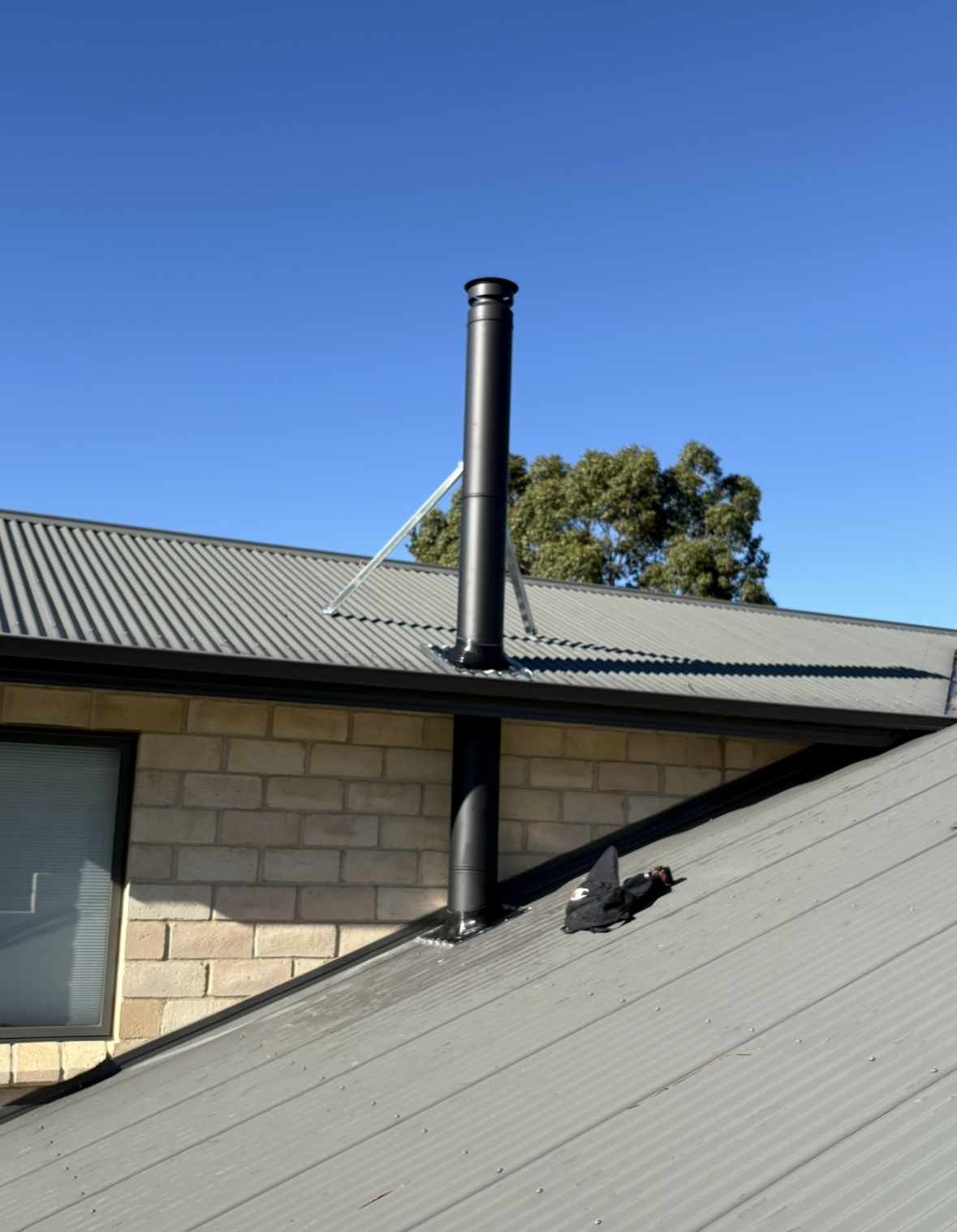 Roof Chimney Pipe Vent on a House — The Flue Pro In Burnie, TAS