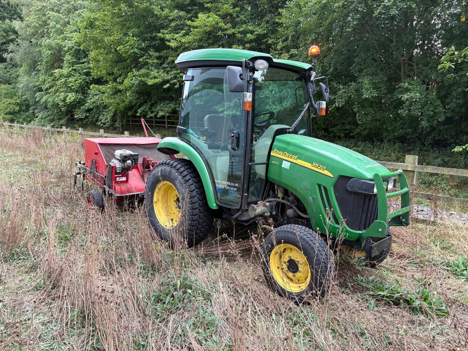 CDTS North & West's John Deere with custom brush seed harvester fitted.