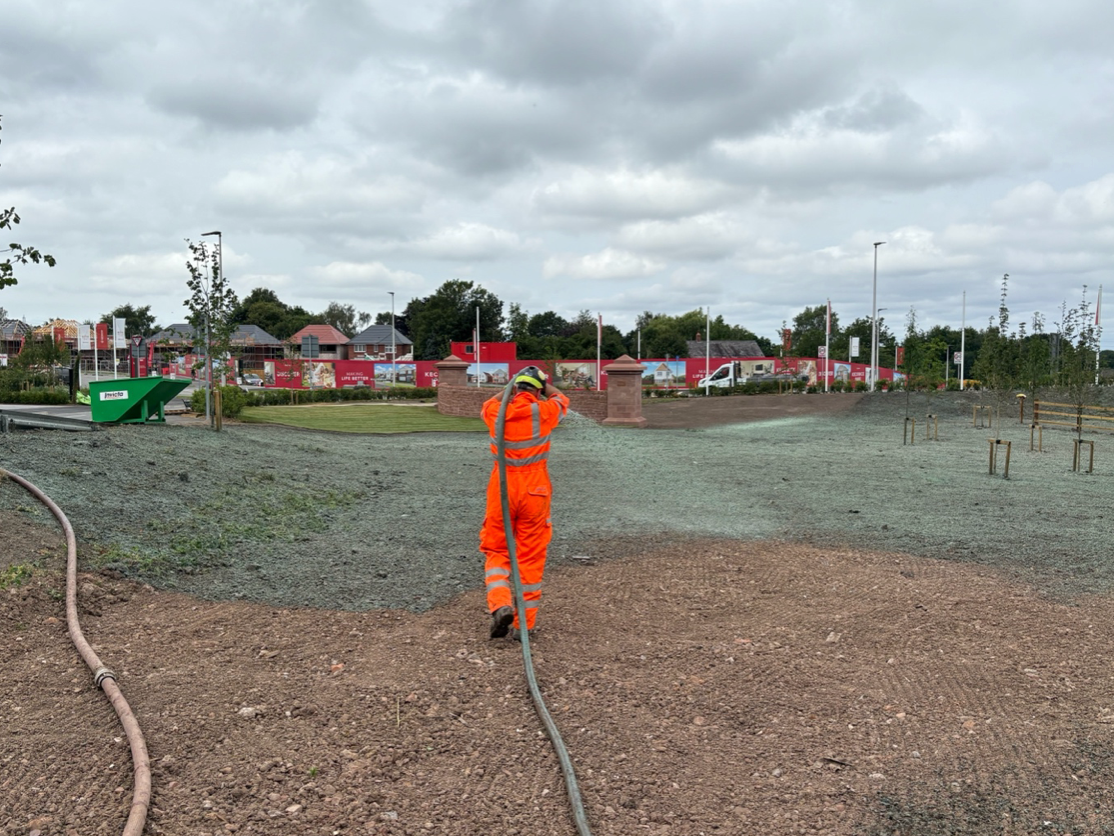 CDTS operative applying hydraulic seeding mulch at Daresbury Housing Development. Over 14,000 m² seeded