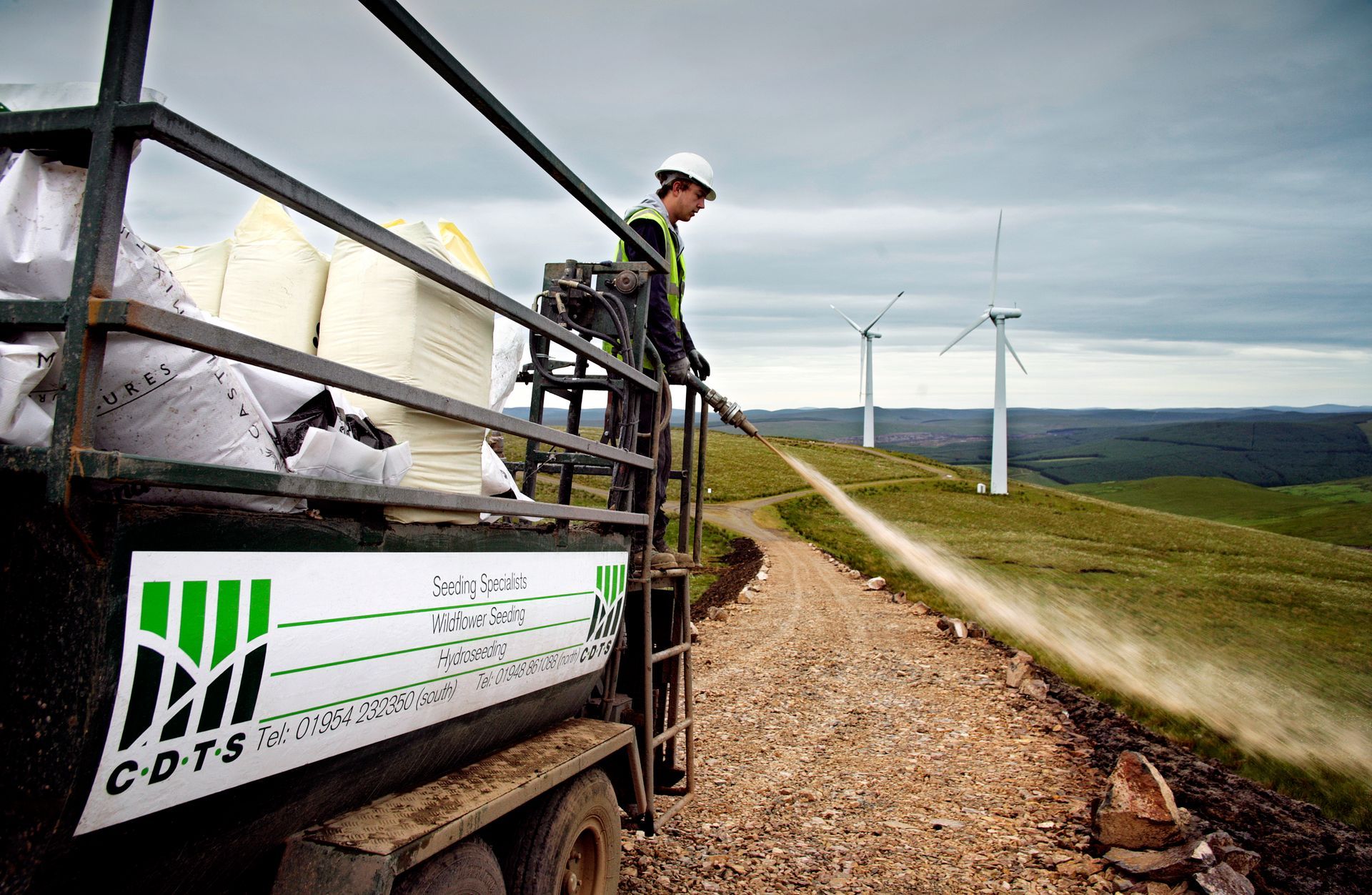 A hydroseeder being towed by a Landrover Discovery at Clyde Wind Farm, Lanarkshire. Over 100 hectares of seeding completed.