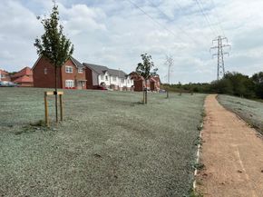 Hydroseeding at a commerical housing development. BFM used to limit surface run off. 