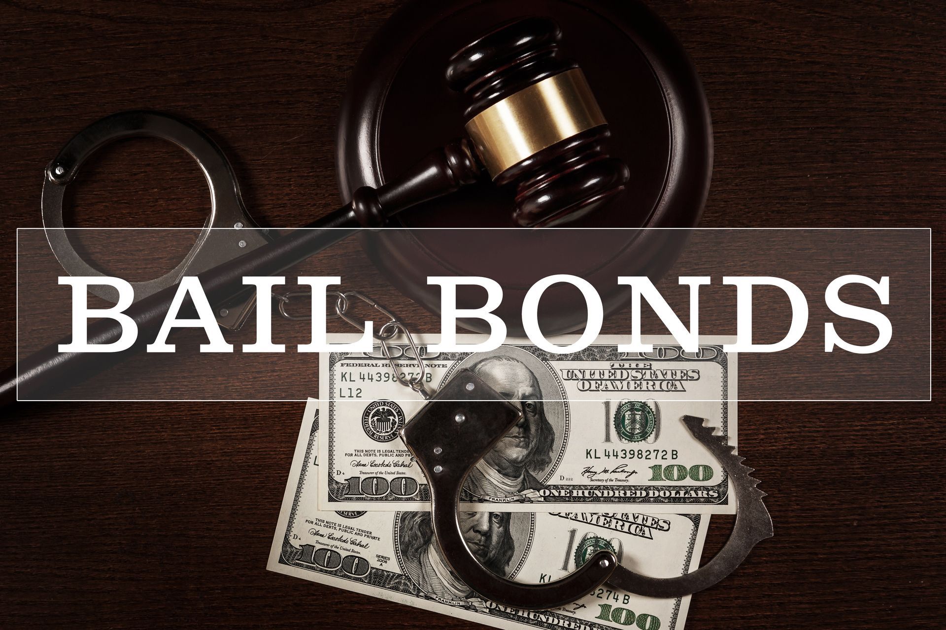 Judge's gavel, handcuffs, and money representing 24-hour bail bond service. Judge's gavel, handcuffs, and money representing 24-hour bail bond service.