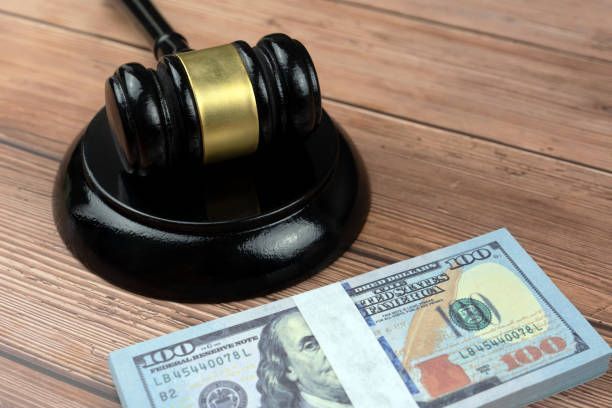 Black Gavel And Block With Hundred Dollar Bills — Vero Beach, FL — Barnett Bail Bonds