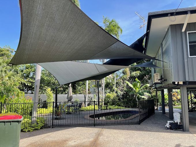 A Large Shade Structure Is Being Built In A Parking Lot — Aerosail Engineered Fabric Structures In Winnellie, NT