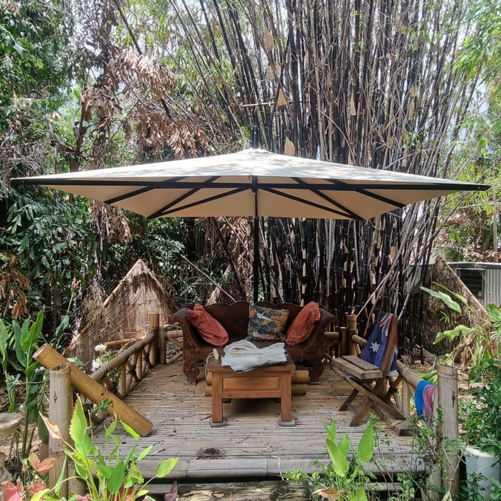 A Structured Shade Sail In A Bush With Trees Behind It — Aerosail Engineered Fabric Structures In Winnellie, NT