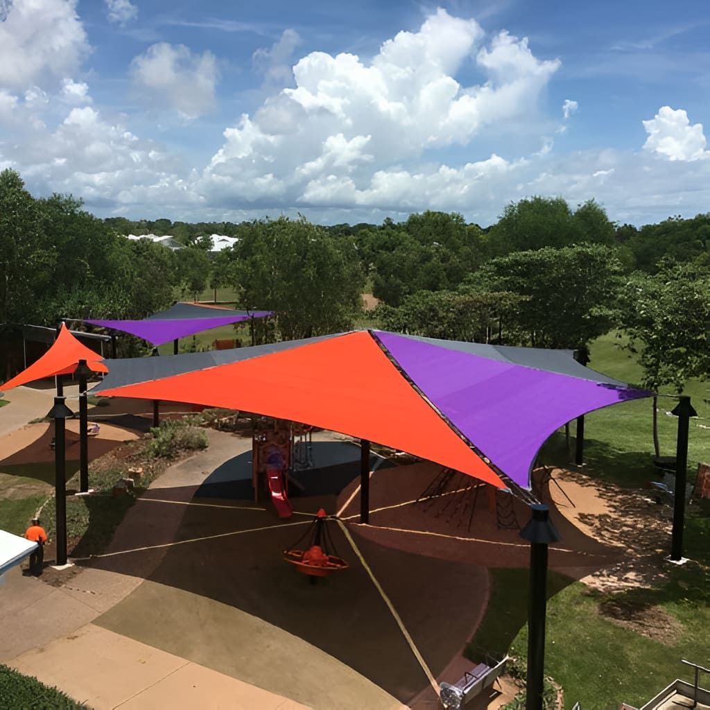 A Purple And Orange Shade Sail Over A Playground— Aerosail Engineered Fabric Structures In Winnellie, NT