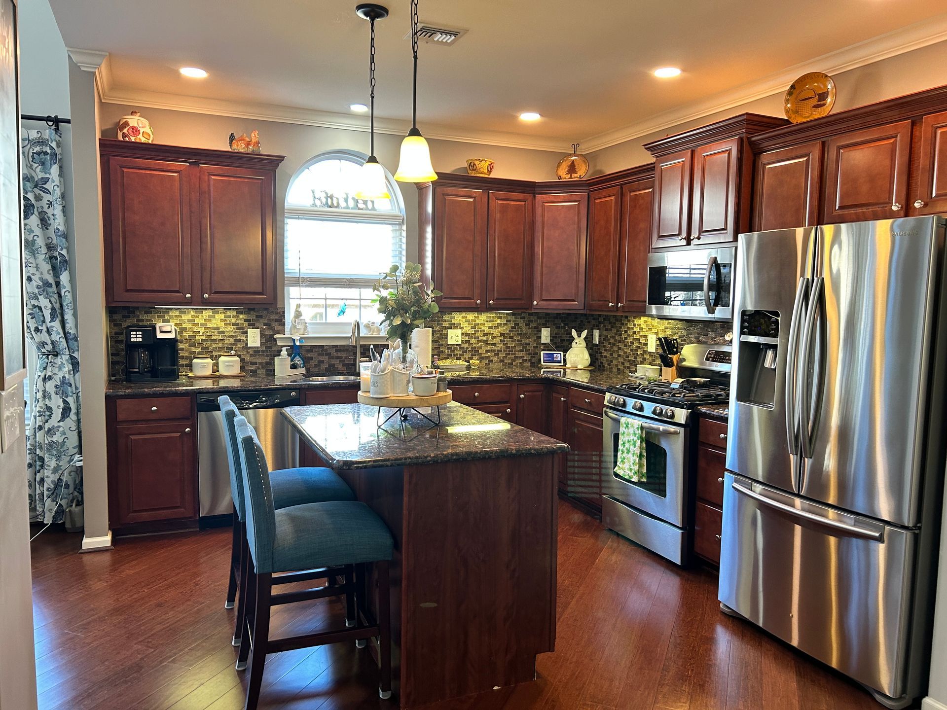 Before and after kitchen cabinet painting in Lancaster, PA