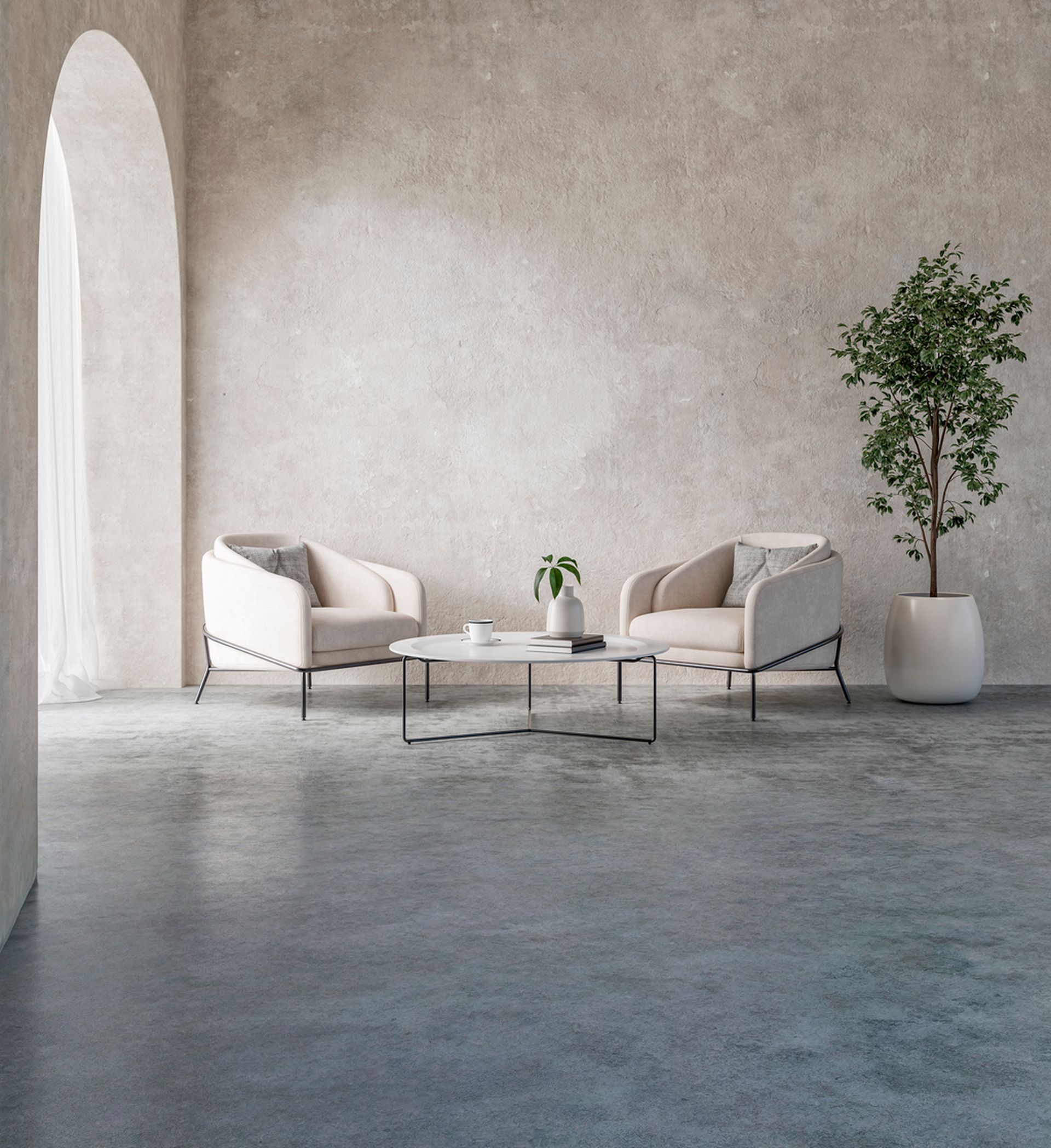 Modern living room with neutral walls, two armchairs, coffee table, and potted tree.