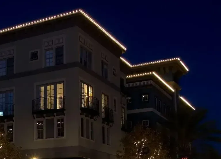 a building with a maids store in front of it