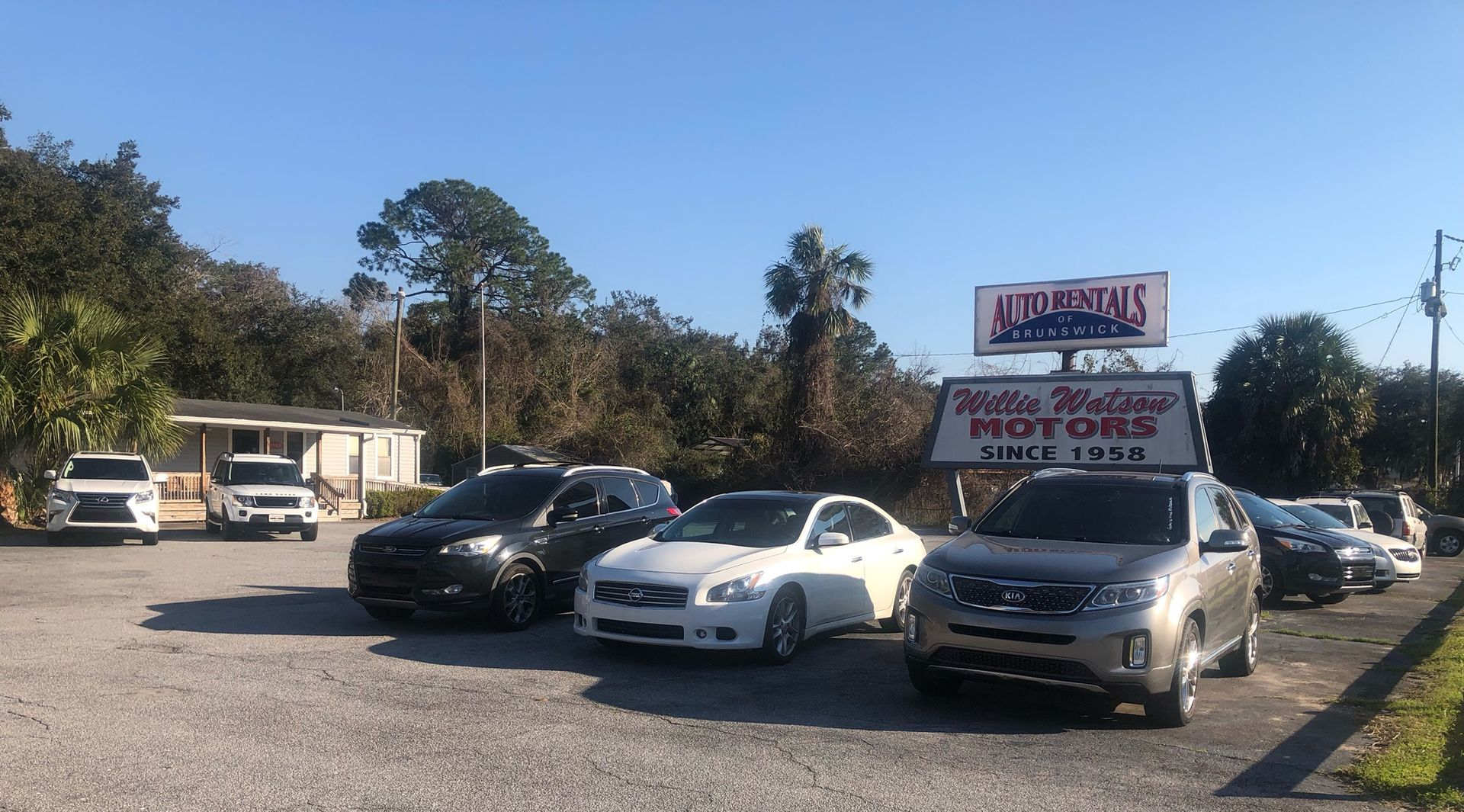 Cars parked at a car dealership,