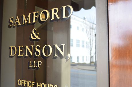 A sign that says samford & denson llp on it