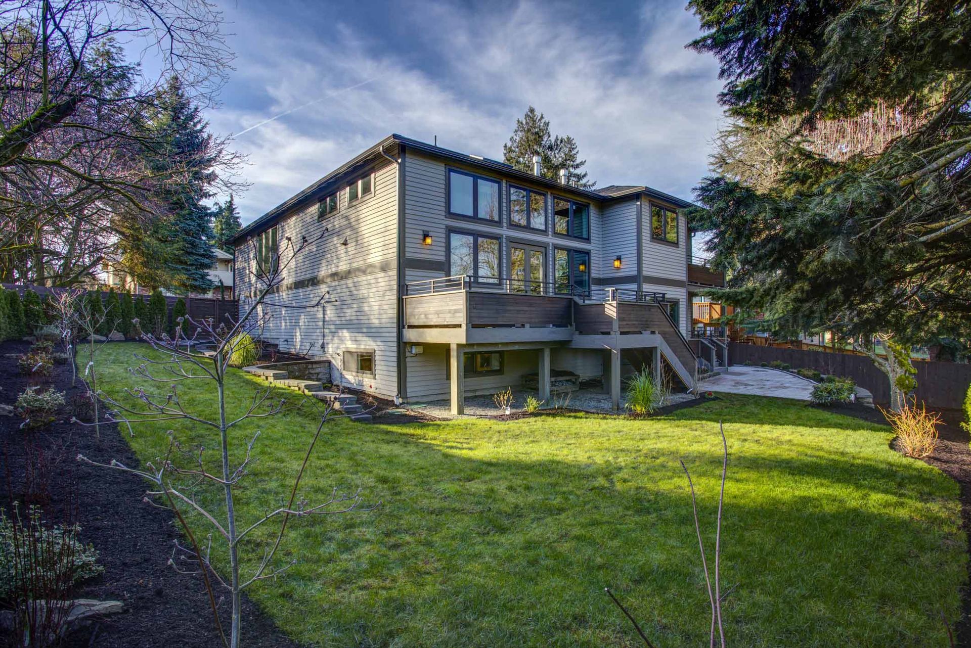 New Construction Home Exterior Boasts Luxury Deck — Spokane, WA — Morris Clark Siding & Roofing New Construction Home Exterior Boasts Luxury Deck — Spokane, WA — Morris Clark Siding & Roofing