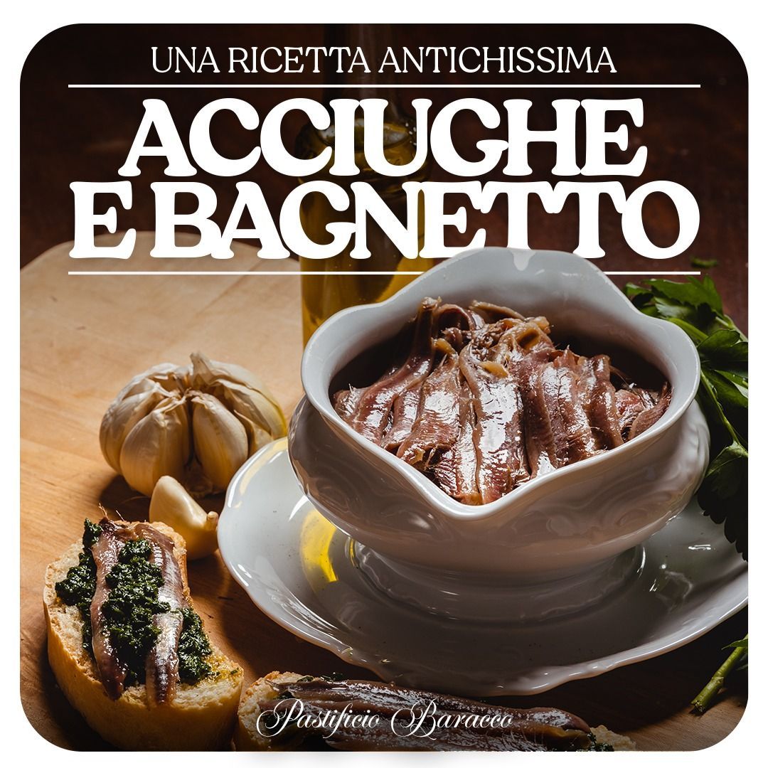 Bowl of anchovy and garlic bagnetto with bread, captioned “Acciughe e bagnetto”