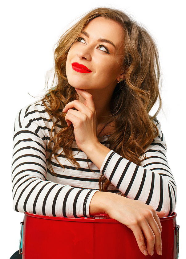 a smiling woman looking up to the sky