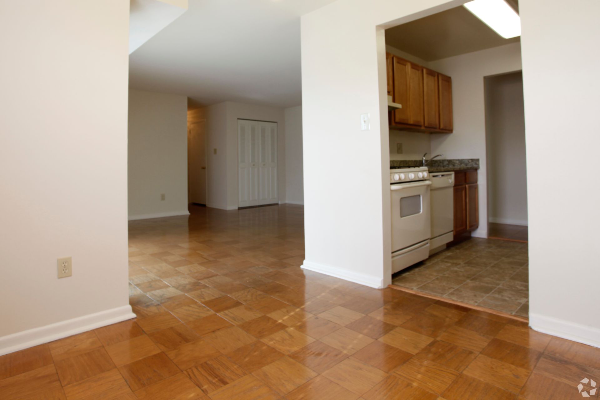Open-concept living and dining area at Summit Square Apartments