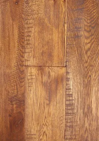Close-up of warm brown wood flooring planks with visible grain and seams