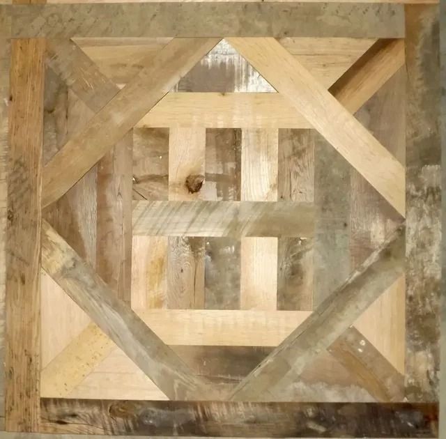 Abstract wooden geometric wall art in beige and brown tones, resembling a woven frame or lattice.