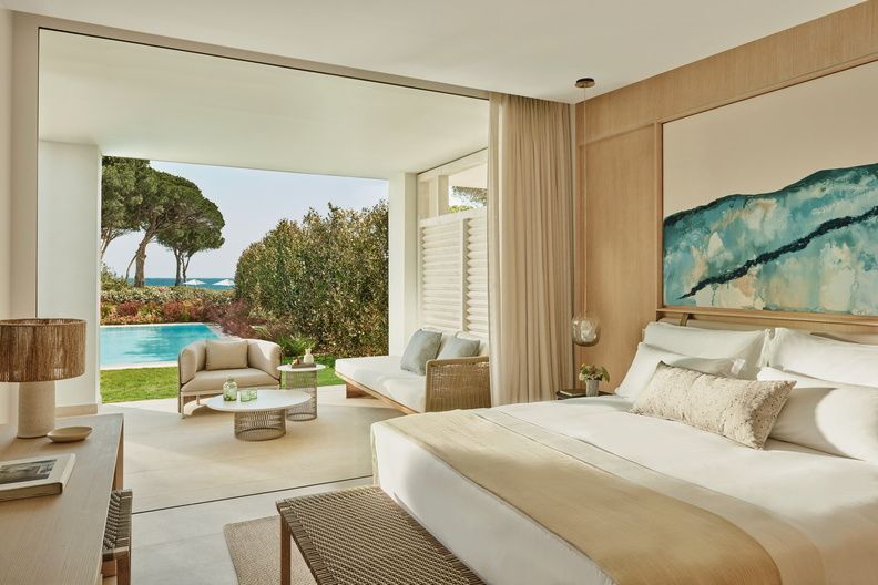 Luxury hotel room with trees seen in the back ground